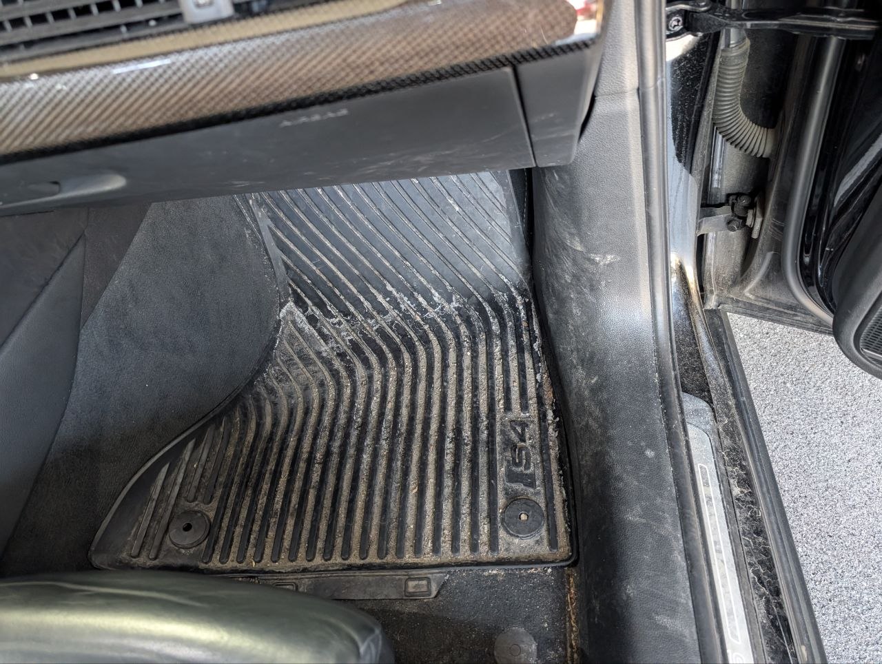 Car interior before detailing — dirty and stained