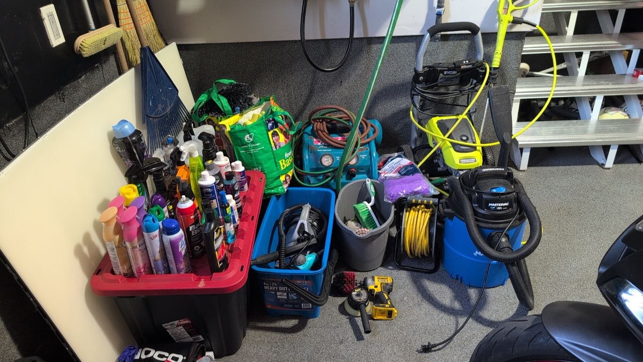 Ivy's Detailing professional tools — vacuum, pressure washer, air compressor, and products
