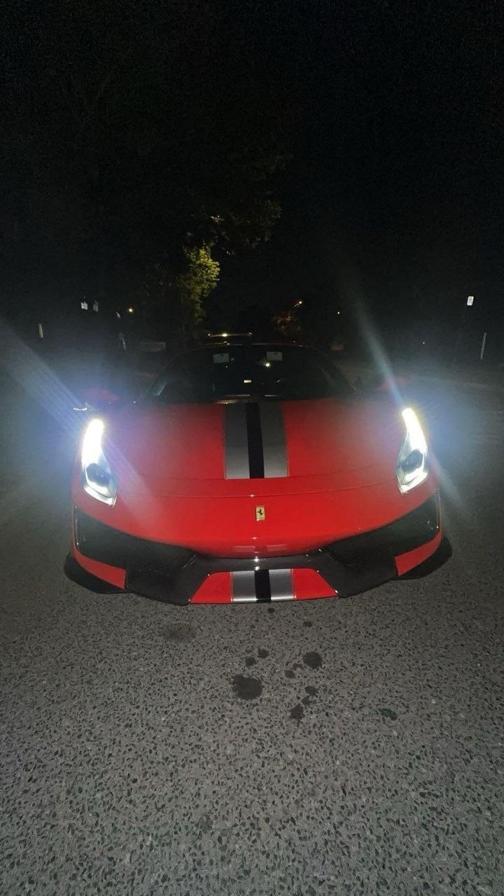 Ferrari after hand detailing — glossy finish