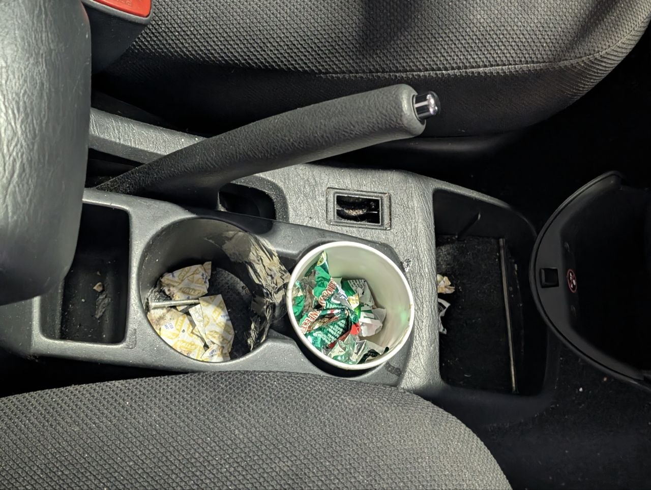 Toyota Matrix console before — candy wrappers