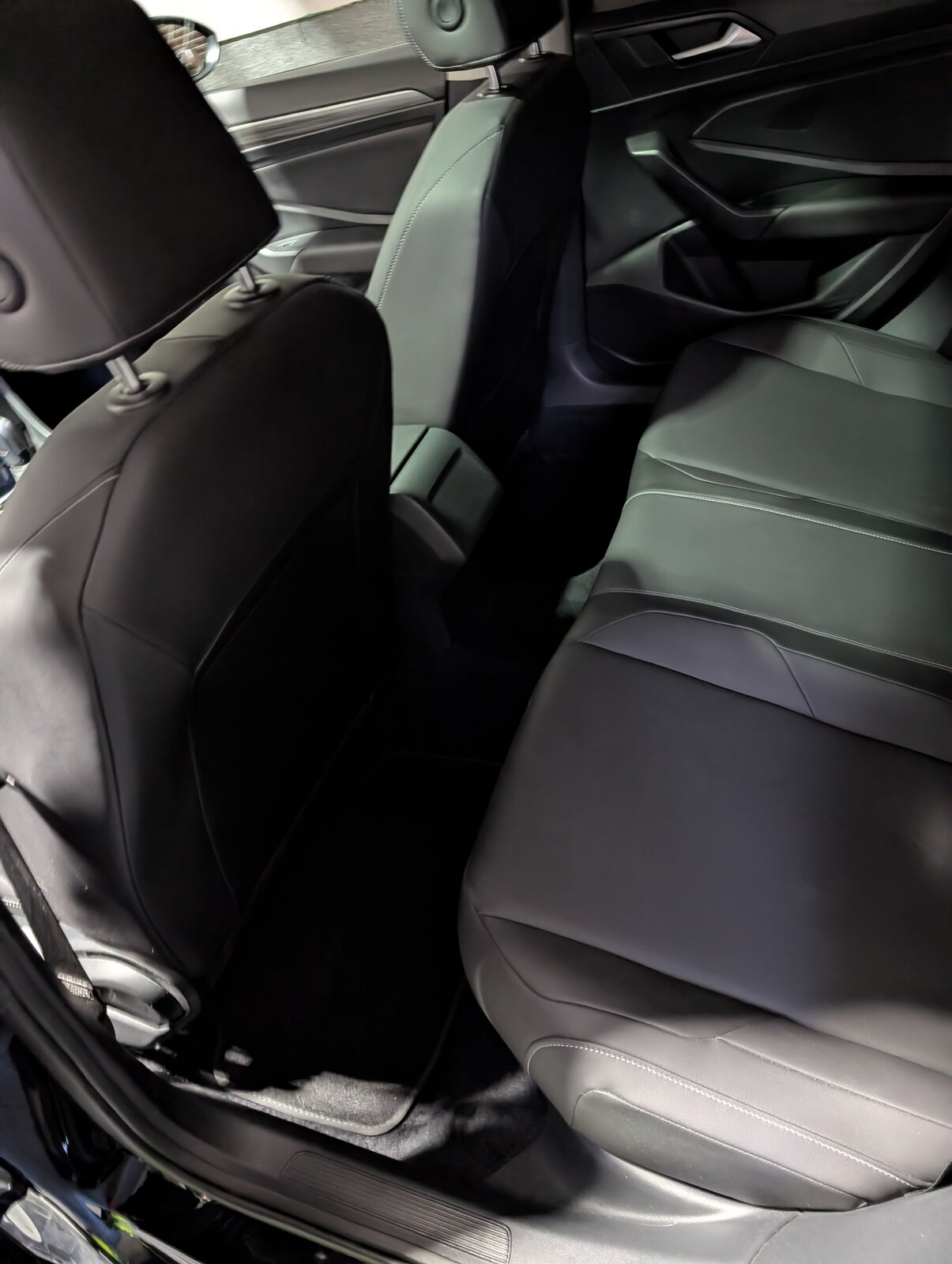 Back seat after detailing — pristine leather