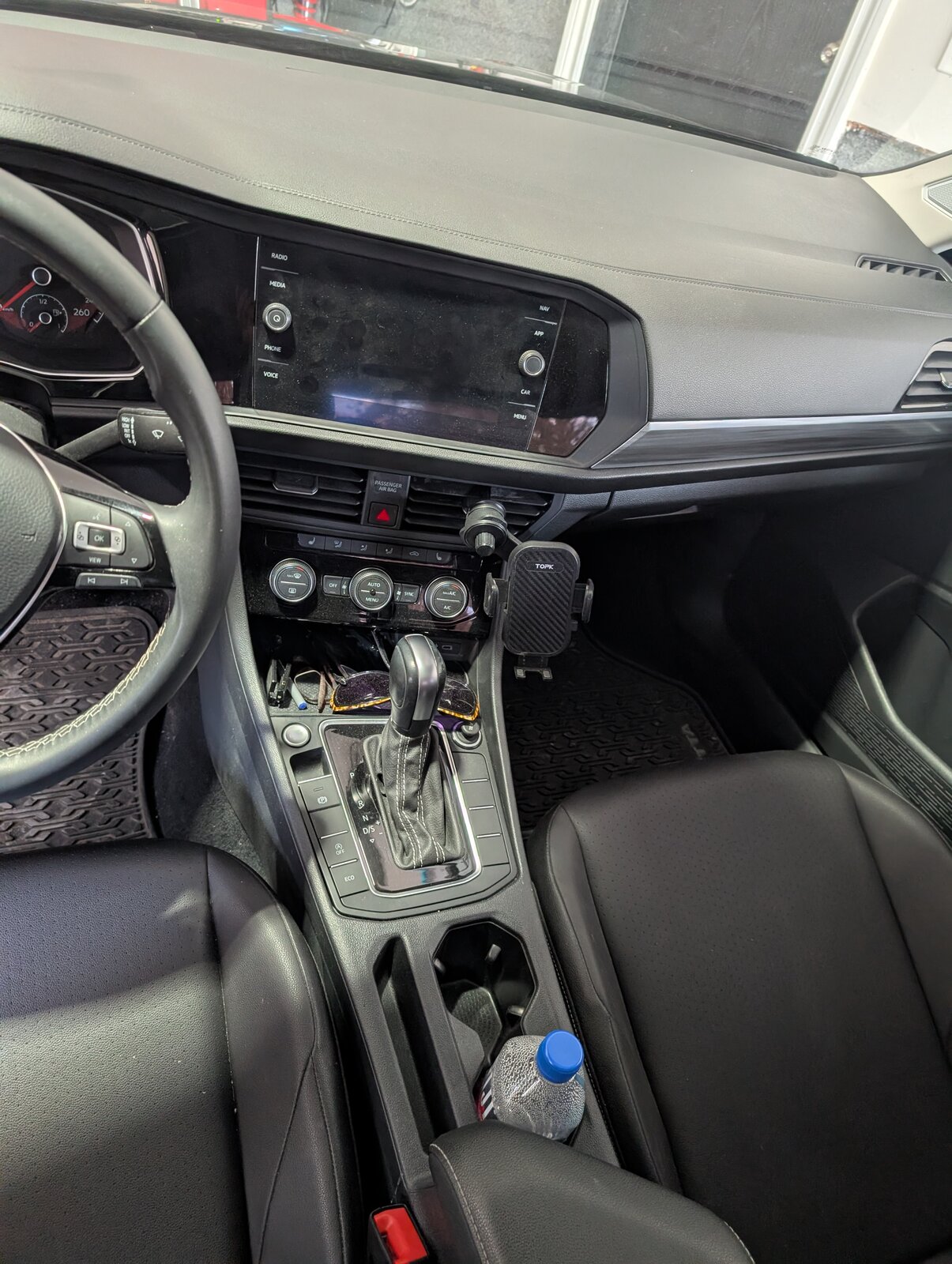 Dashboard before — dust and clutter